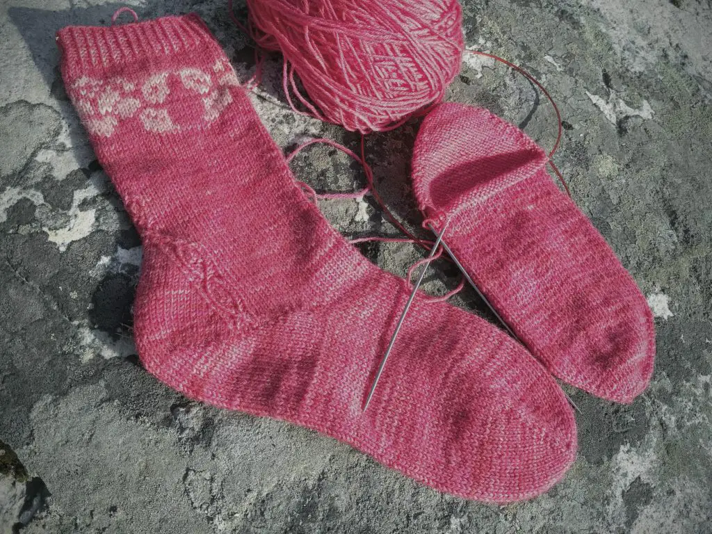 Handmade sock with rose motif