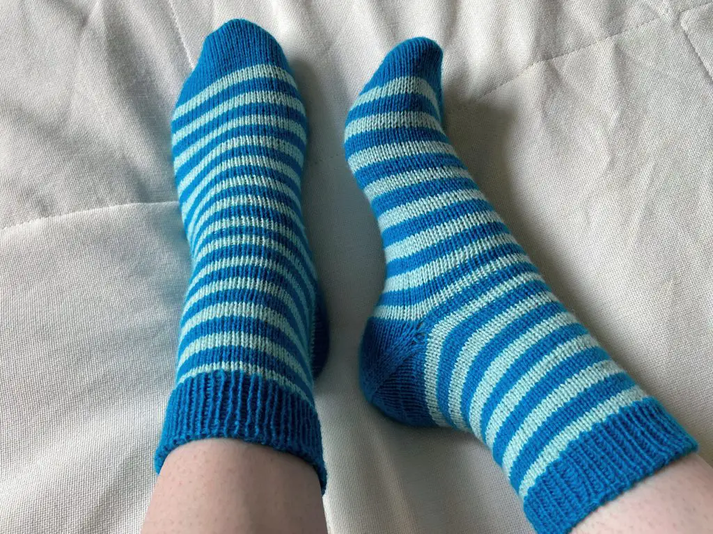 Knit striped sock with afterthought heel.